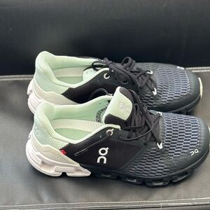 On Running White and Gray Sneakers